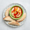 Romige Hummus Met Peri Peri Drizzle Pita