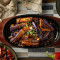 Sizzling Platter Of Eggplant With Shredded Pork Tiě Bǎn Yú Xiāng Jiā Zi