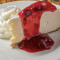 Supreme Cheesecake With Raspberry Sauce