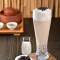 Dòng Hóng Chá Zhēn Zhū Ná Tiě Iced Black Tea Latte With Pearls